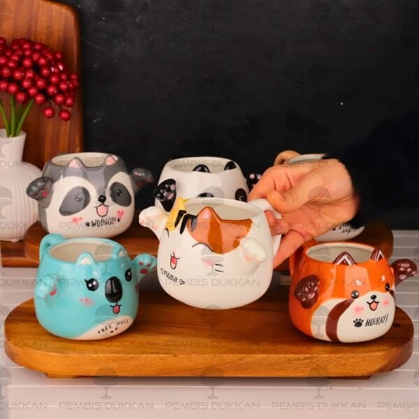 1 ADET KUCAKLAYAN HAYVAN FİGÜRLÜ SERAMİK KUPA (MODEL SEÇİN)
